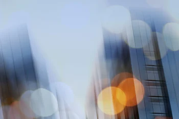 Abstract double-exposure images of futuristic architecture and lens flares